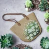 Handgewebte Seegras-Handtasche – Weißes Gänseblümchen-Motiv 1